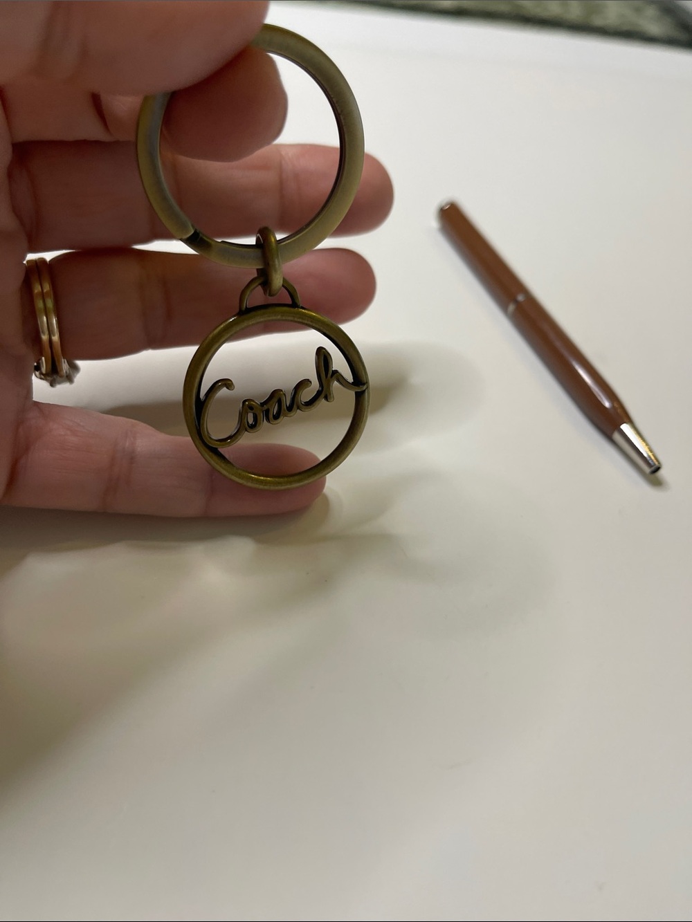 Coach Brass Logo Circle Keyring and Brown Coach Pen - Picture 5 of 8